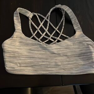Grey and white lululemon sports bra